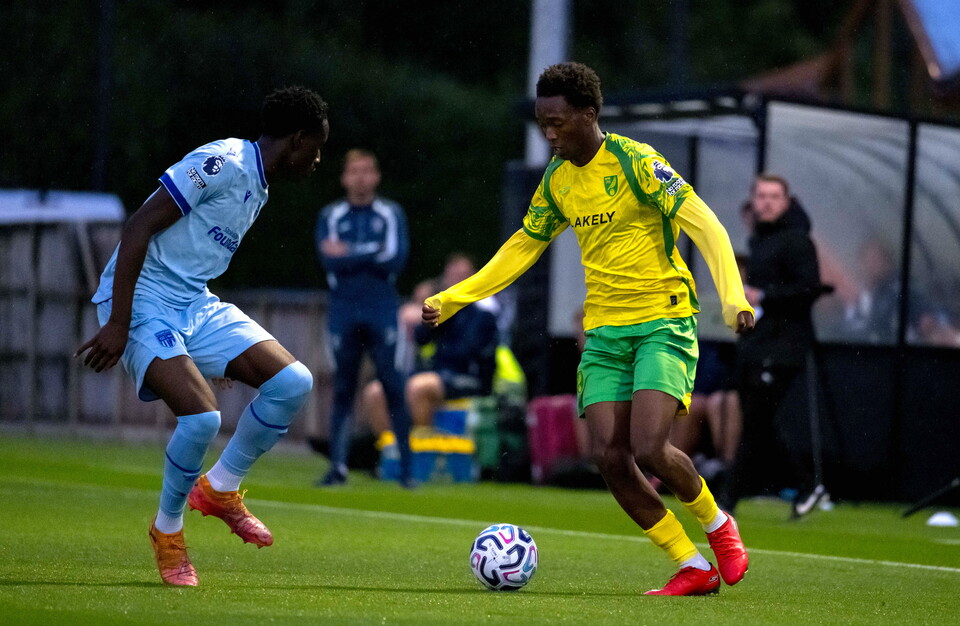 Errol Mundle-Smith taking on his man against Stoke City U21s