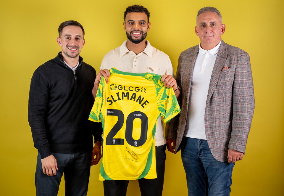 Norwich City players pose for pictures with the club partners