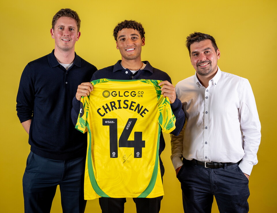 Norwich City players pose for pictures with the club partners
