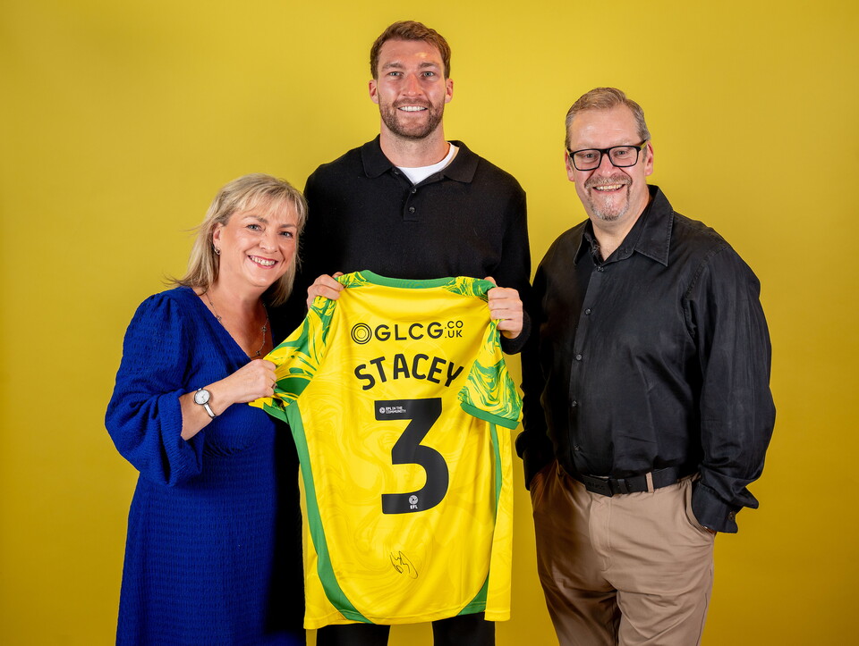 Norwich City players pose for pictures with the club partners
