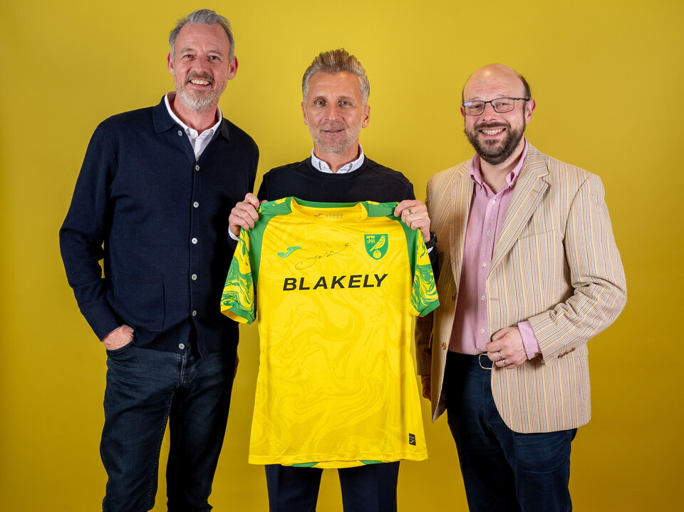 Norwich City players pose for pictures with the club partners