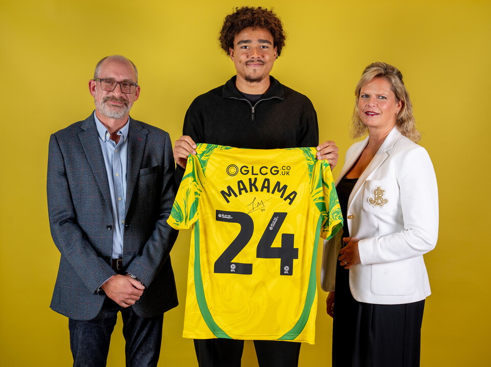 Norwich City players pose for pictures with the club partners