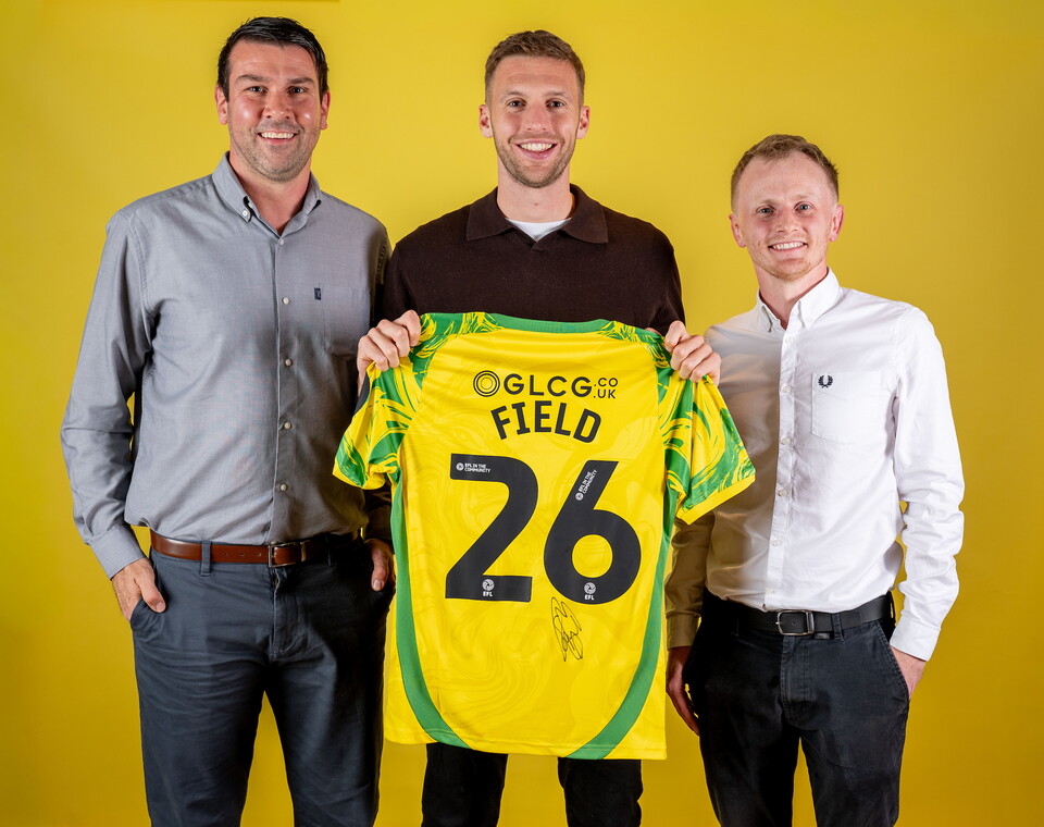 Norwich City players pose for pictures with the club partners