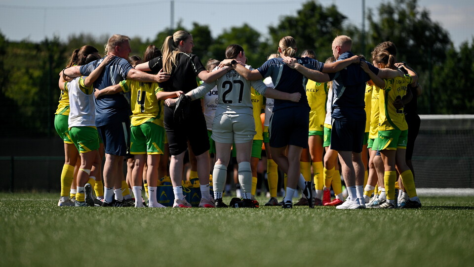 Women's team huddle