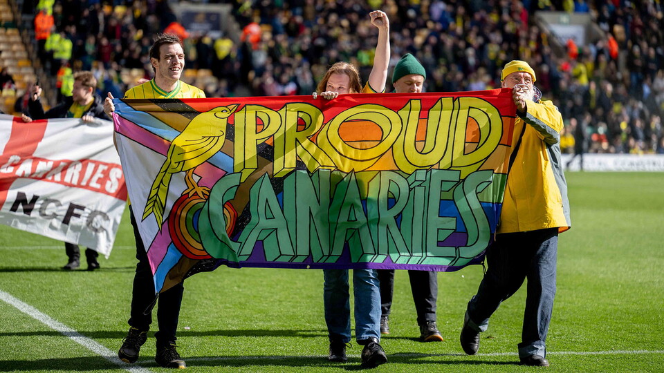 supporter groups carrying a flag