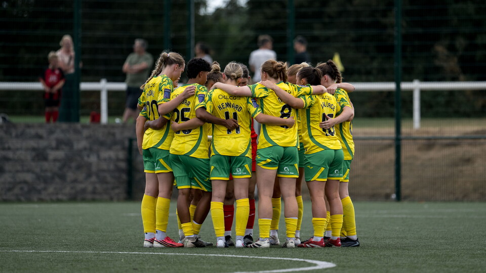 Norwich City Women in a huddle