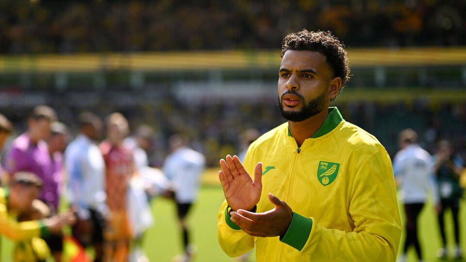 Anis Ben Slimane walking out onto the pitch at Carrow Road