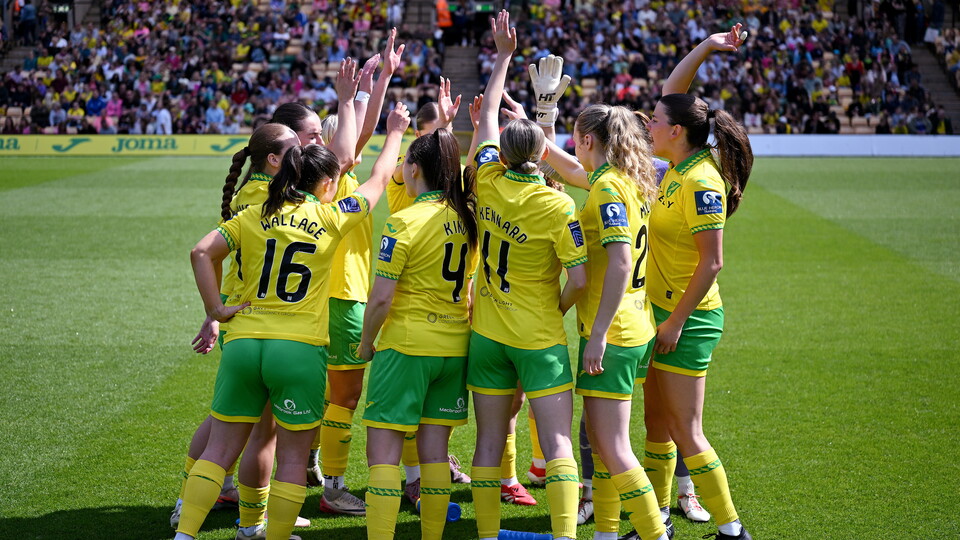 Norwich City Women team huddle at Carrow Road