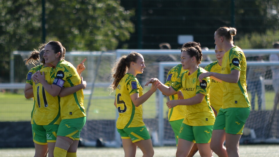 Norwich City Women celebrate scoring against Stoke City