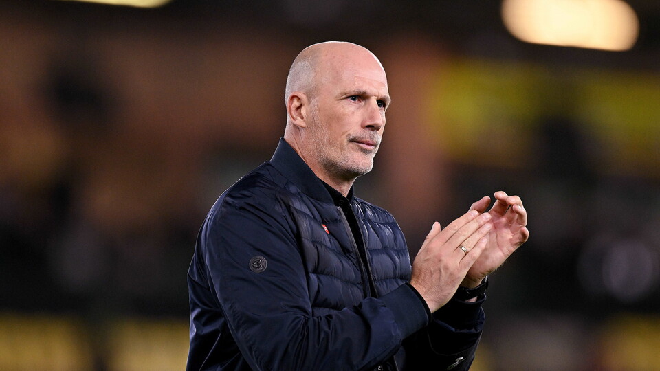 Philippe Clement claps the fans at Carrow Road