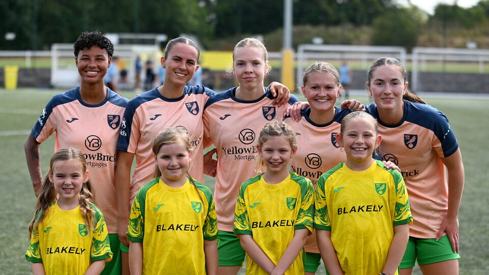 Norwich City Women pose with mascots