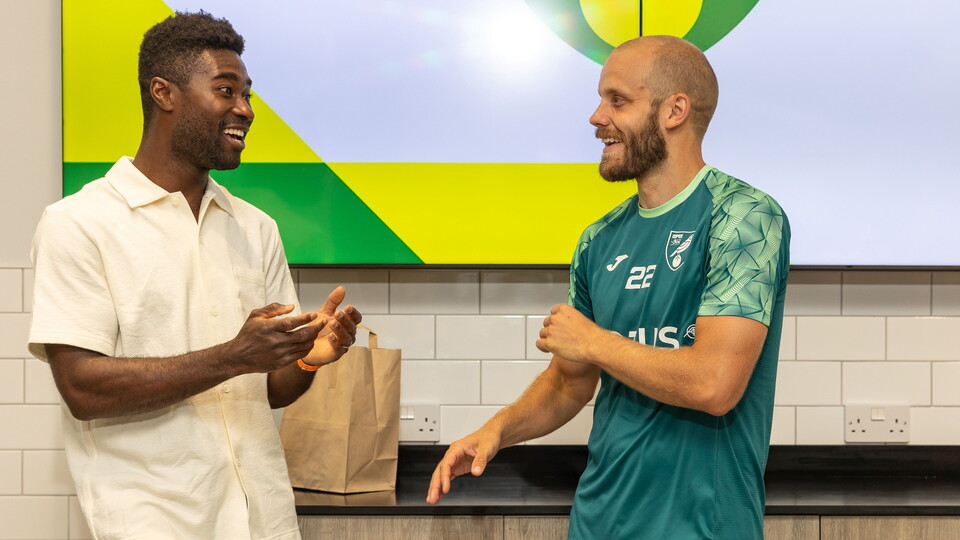 Alex Tettey was among the Norwich City legends to present landmark shirts to the first team squad this afternoon.