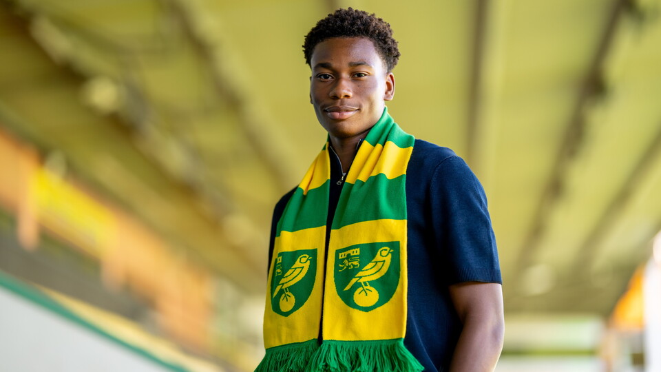 Academy defender Oser Okpiabhele has signed his first professional contract at Norwich City.
