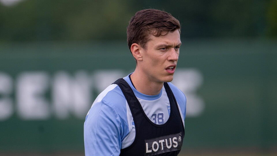 Norwich City have recalled goalkeeper Jon McCracken from his loan spell with Scottish Premiership club Dundee.