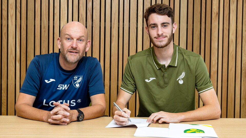 Norwich City academy defender Charlie Wilson has signed a contract extension until 2026, with an option of a further year.