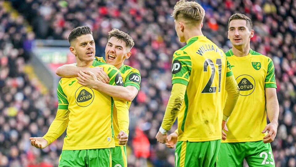Norwich City put in a spirited performance at Anfield before going down to a 3-1 defeat.