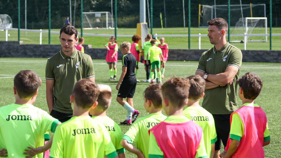 Liam Gibbs and Christian Fassnacht were surprise visitors to a summer soccer school at The Nest on Wednesday afternoon.