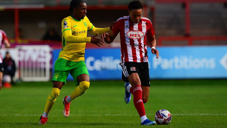 Norwich City Under-21s began their Premier League Cup campaign with a 2-1 defeat away to Exeter City on Wednesday evening.