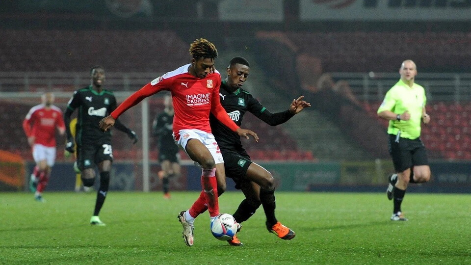 Norwich City loanee Tyrese Omotoye made his first senior start in professional football for Swindon Town on Tuesday night.