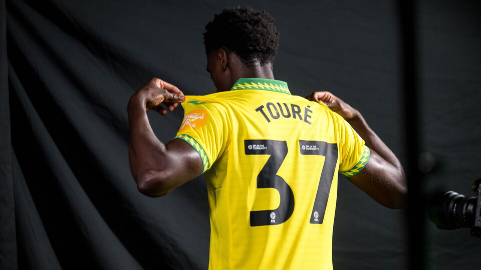 Norwich City have signed Australian international Mohamed Touré and fans can get free 'TOURÉ 37' printing on any new replica shirt purchased before 11.59pm on Sunday, February 8.
