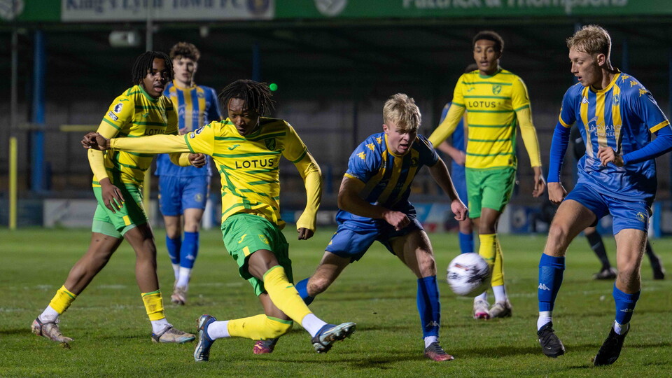 Norwich City Under-21s progressed into the semi-finals of the Norfolk Hire Senior Cup with a 2-0 win over King's Lynn Town Under-23s.