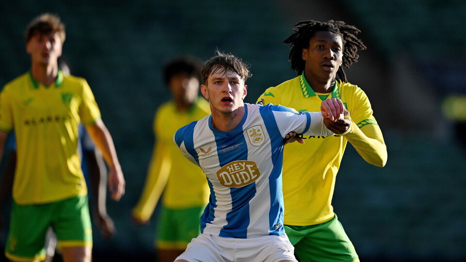 Norwich City Under-21s lost out to Huddersfield Under-21s in the PDL play-off final in a six-goal thriller at Carrow Road.