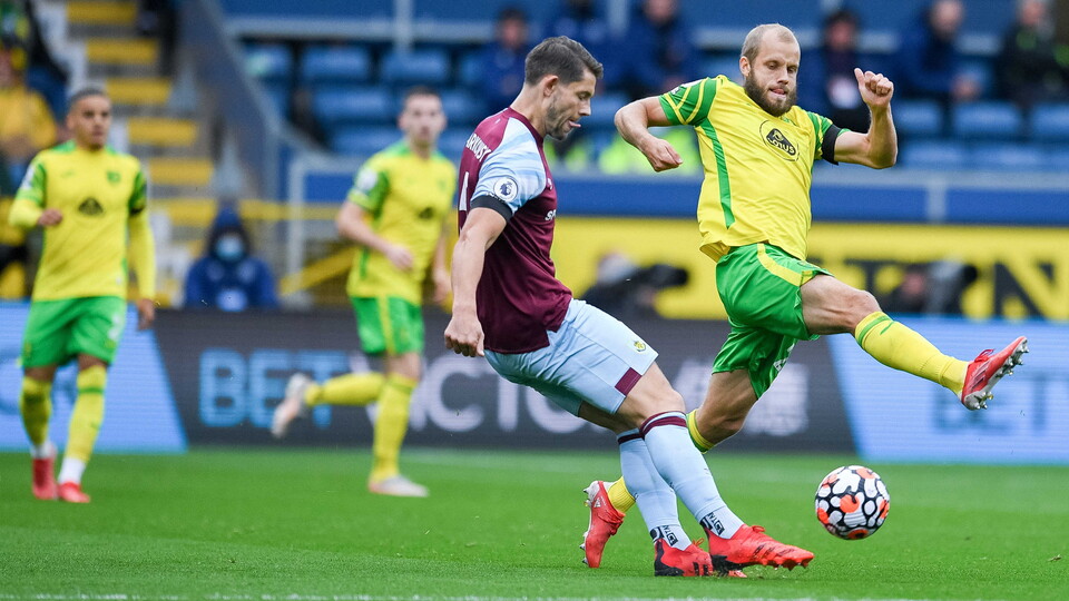 Norwich City picked up their first point of the Premier League season with a resolute defensive display at Burnley.