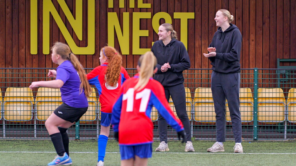 Norwich City Women players Ellie Bishop and Freya Symonds attended a Girls Schools League tournament at The Nest.