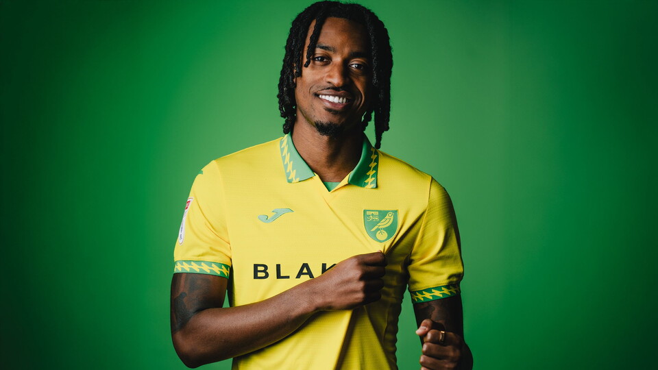 Norwich City have completed the permanent signing of midfielder Paris Maghoma from Premier League club Brentford.