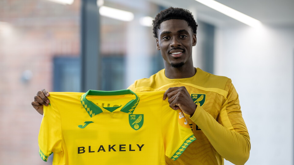 Norwich City have completed the signing of forward Mohamed Touré from Danish Superliga side Randers.