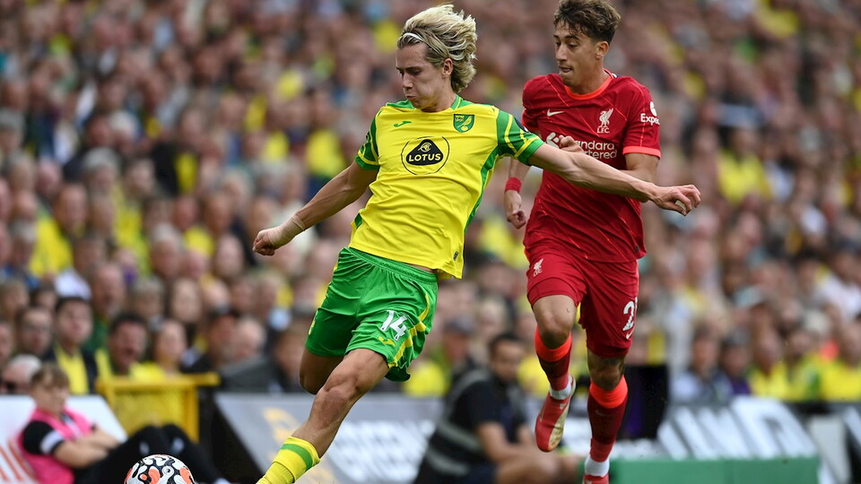 Goals from Diogo Jota, Robert Firmino and Mohamed Salah sent Norwich City to defeat on the opening day of the Premier League season at Carrow Road.