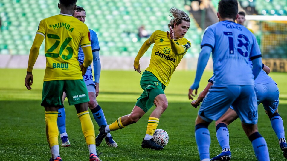 Norwich City went through to the fourth round of the FA Cup with a 2-0 win at home to Coventry City on Saturday.