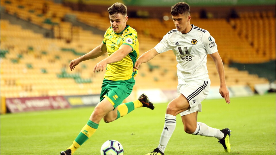Norwich City midfielder Simon Power has joined League Two side Harrogate Town on a permanent deal.