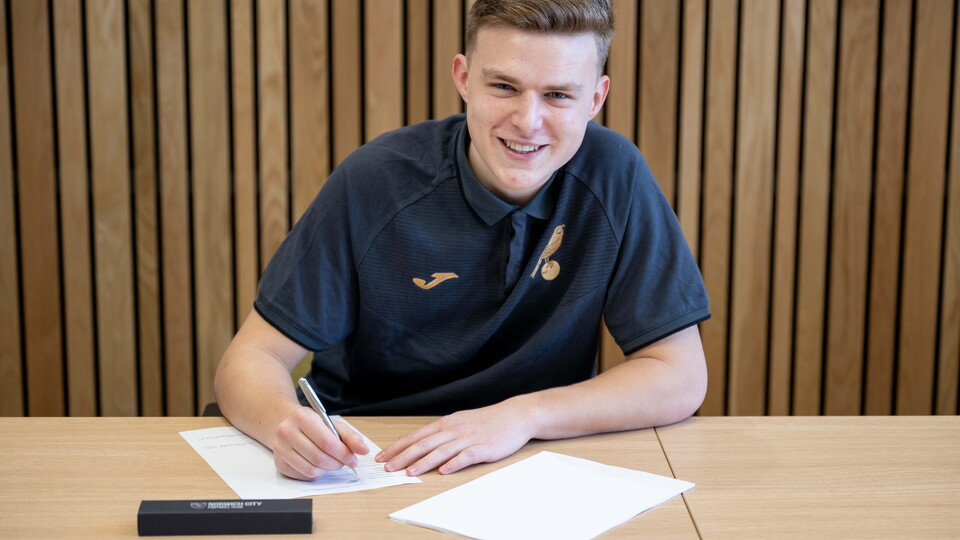 Norwich City Academy midfielder Harry Brooke is setting his sights on establishing himself in the under-23s set-up after signing a new contract with the club. 