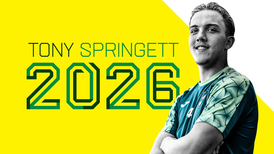 Norwich City midfielder Tony Springett has signed a contract extension with the club until 2026, with the option of a further year.