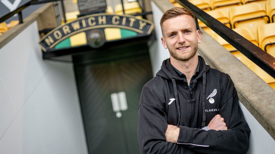 Goalkeeper George Long has extended his stay at Norwich City, signing a new three-year contract with the club.