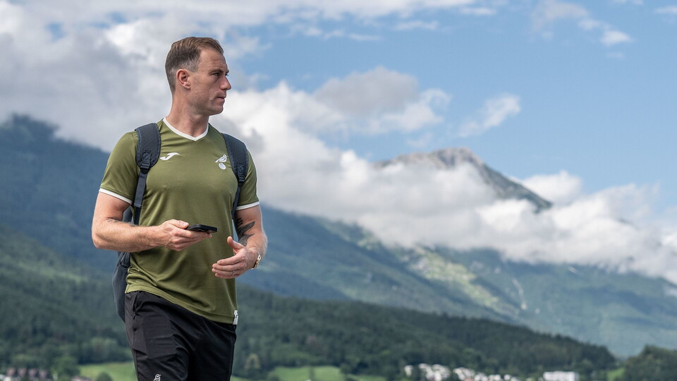 The first team take in the scenery at Innsbruck Airport after arriving for their final camp of pre-season.