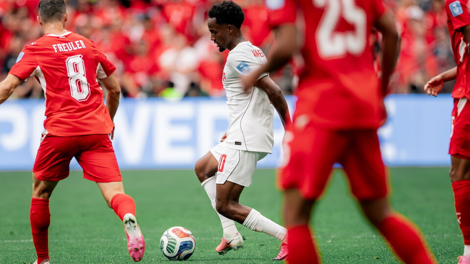 Two Canaries will battle it out in the knockout stages of the FIFA World Cup after both Ali Ahmed and Mohamed Touré helped Canada and Australia secure places in the round of 32.