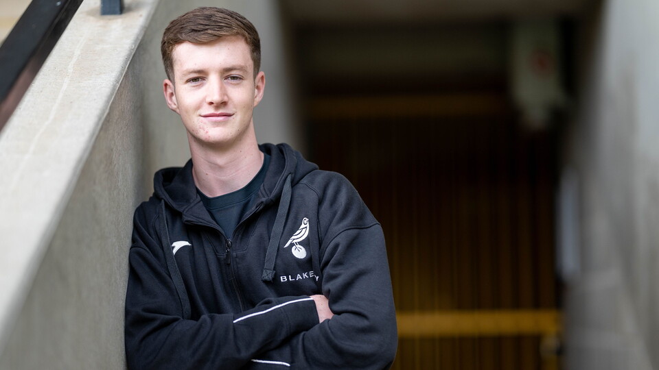 Norwich City's Kellen Fisher has signed a new contract, keeping him at the club until 2028, with the option of an additional year.