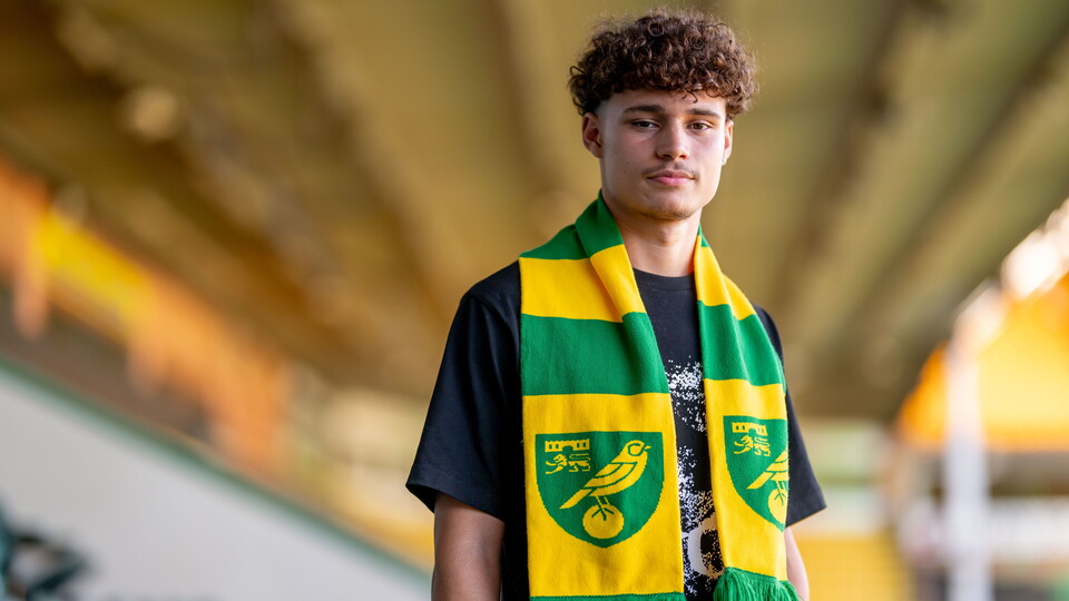 Academy defender Finlay Oligbo has signed his first professional contract at Norwich City.