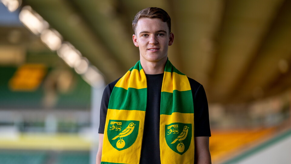 Norwich City have completed the signing of young midfielder Luke Towler after his departure from Ipswich Town.