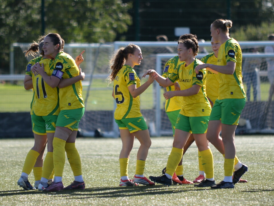 Norwich City Women celebrate scoring against Stoke City