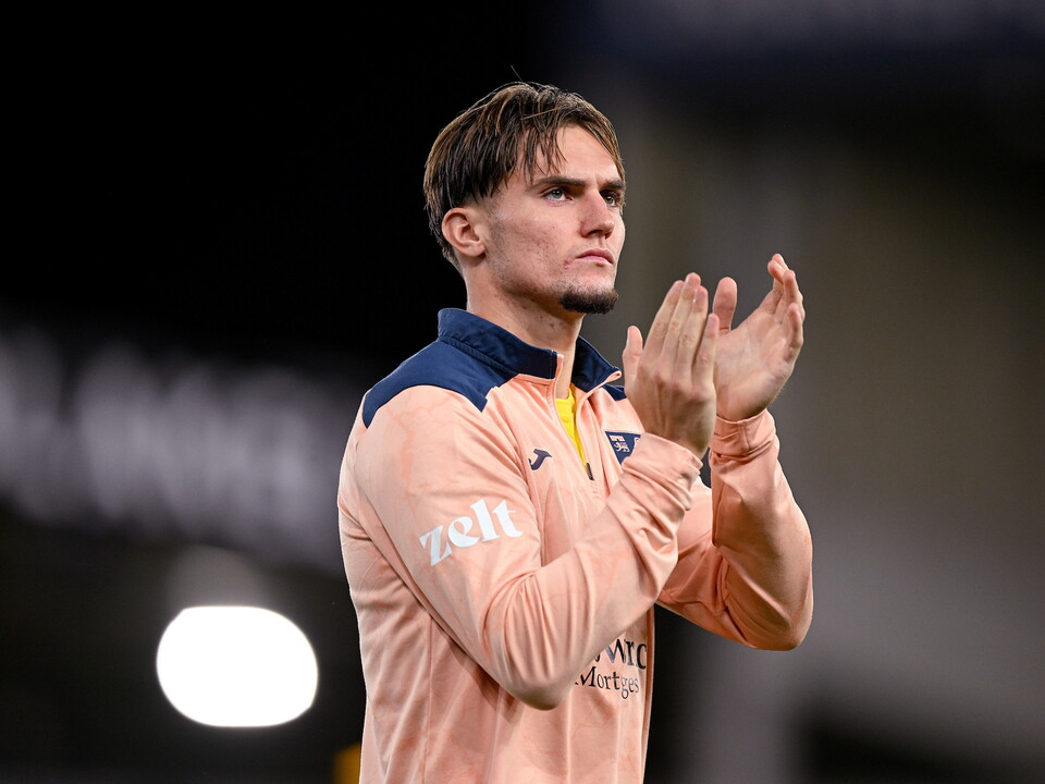 Jacob Wright clapping the fans